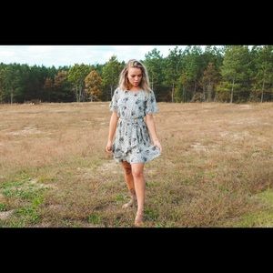 Black and ivory patterned wrap dress